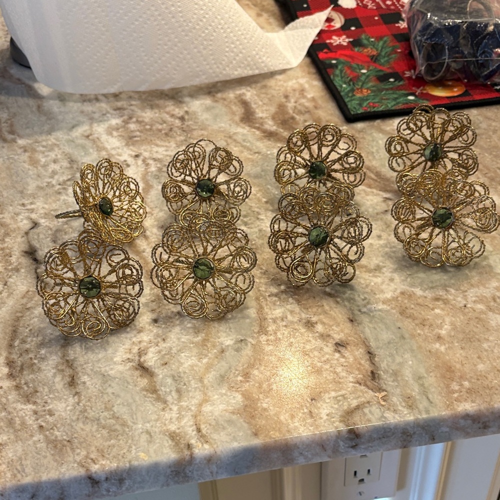 Elegant Gold Napkin Rings with Green Accents